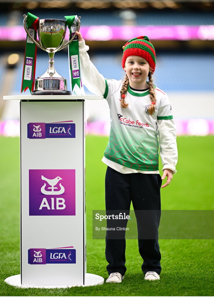 13 December 2025; Knockbride mascot Erin O'Brien with the cup before the AIB All-Ireland Ladies Football Club Intermediate Club Championship final match between Knockbride of Cavan and Caltra Cuans of Galway at Croke Park in Dublin. Photo by Shauna Clinton/Sportsfile
