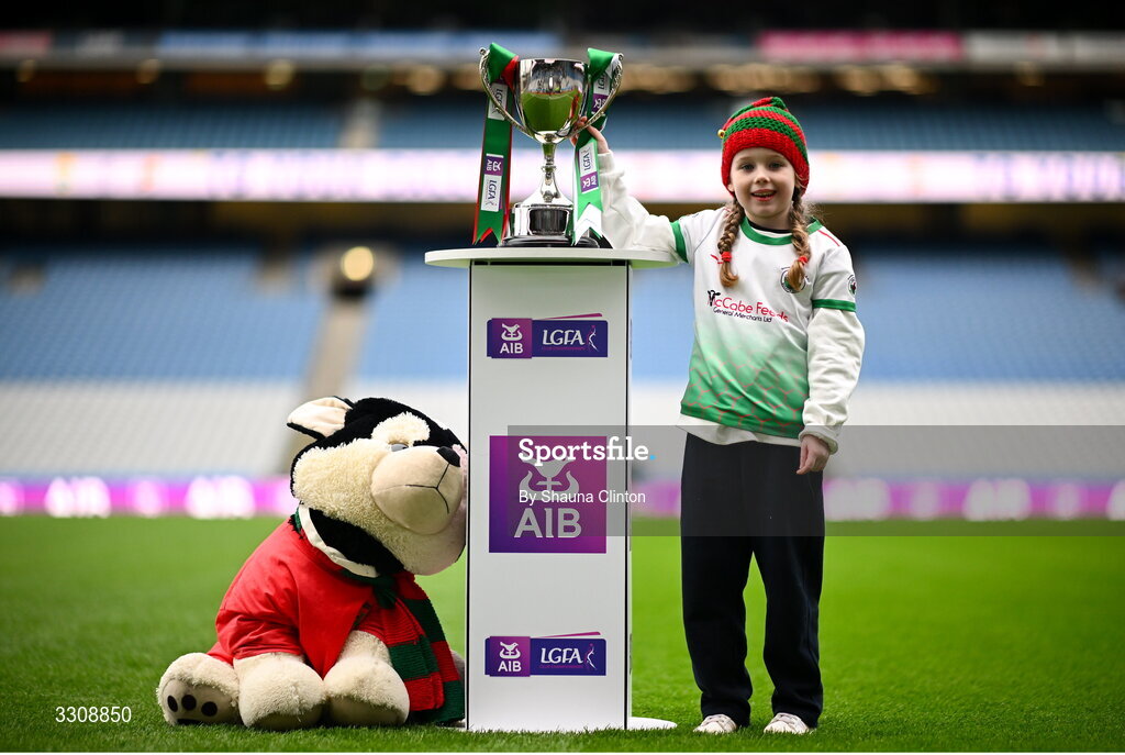 13 December 2025; Knockbride mascot Erin O'Brien with the cup before the AIB All-Ireland Ladies Football Club Intermediate Club Championship final match between Knockbride of Cavan and Caltra Cuans of Galway at Croke Park in Dublin. Photo by Shauna Clinton/Sportsfile