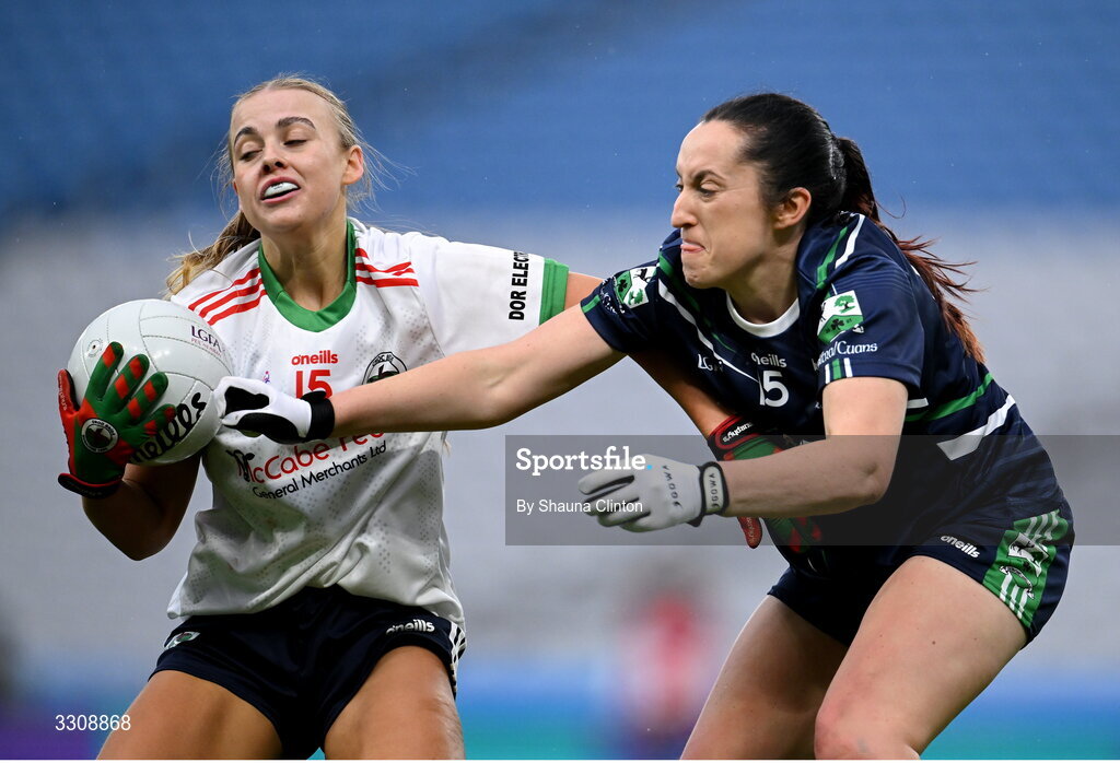 13 December 2025; Abbi Connor of Knockbride in action against Laura Naughton of Caltra Cuans during the AIB All-Ireland Ladies Football Club Intermediate Club Championship final match between Knockbride of Cavan and Caltra Cuans of Galway at Croke Park in Dublin. Photo by Shauna Clinton/Sportsfile