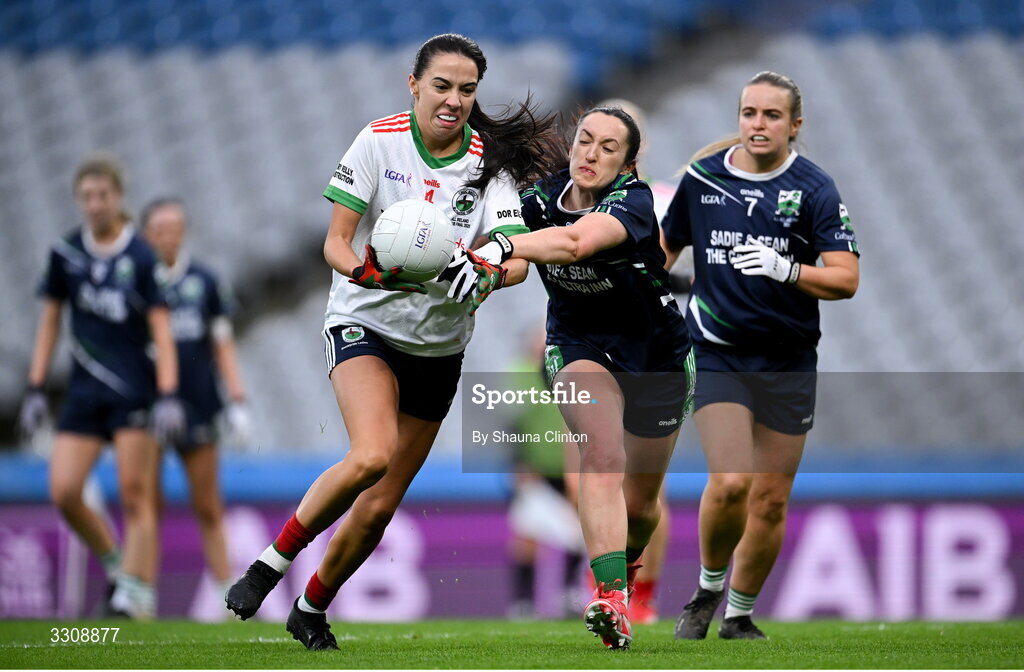 13 December 2025; Katie Rogers of Knockbride in action against Laura Naughton of Caltra Cuans during the AIB All-Ireland Ladies Football Club Intermediate Club Championship final match between Knockbride of Cavan and Caltra Cuans of Galway at Croke Park in Dublin. Photo by Shauna Clinton/Sportsfile