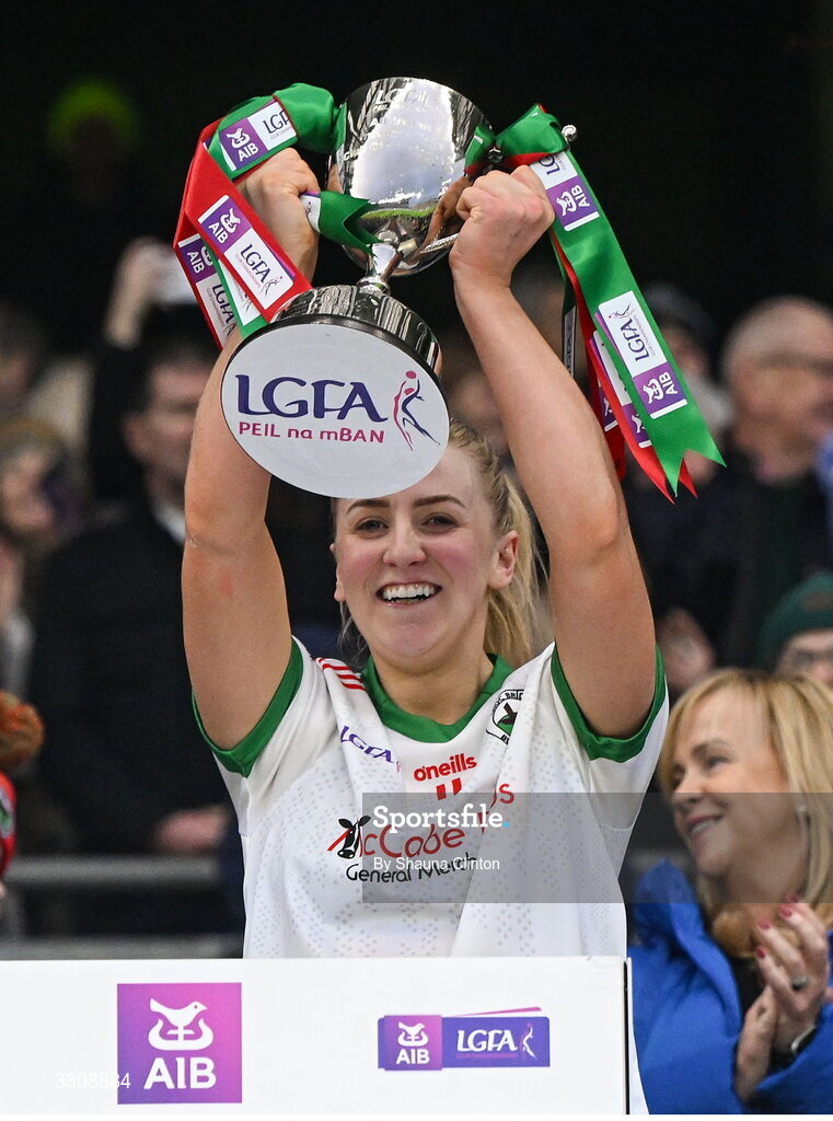 13 December 2025; Knockbride captain Sarah McCabe lifts the cup after the AIB All-Ireland Ladies Football Club Intermediate Club Championship final match between Knockbride of Cavan and Caltra Cuans of Galway at Croke Park in Dublin. Photo by Shauna Clinton/Sportsfile