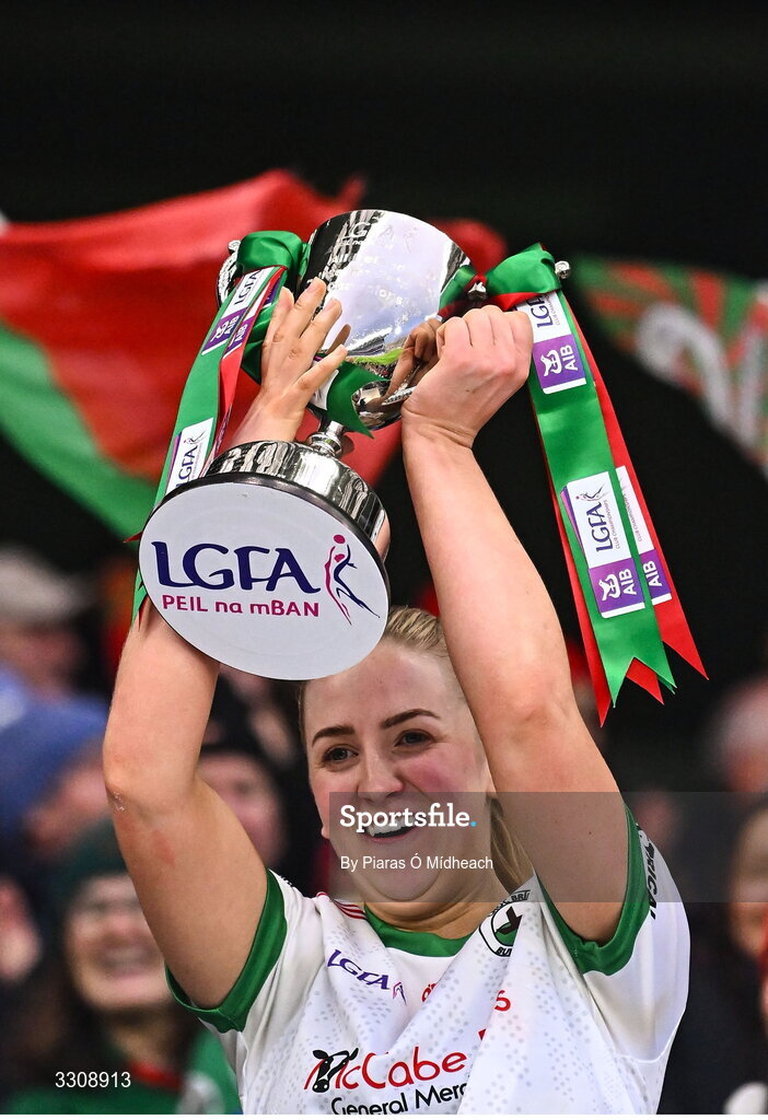 13 December 2025; Knockbride captain Sarah McCabe lifts the cup after her side's victory in the AIB All-Ireland Ladies Football Club Intermediate Club Championship final match between Knockbride of Cavan and Caltra Cuans of Galway at Croke Park in Dublin. Photo by Piaras Ó Mídheach/Sportsfile
