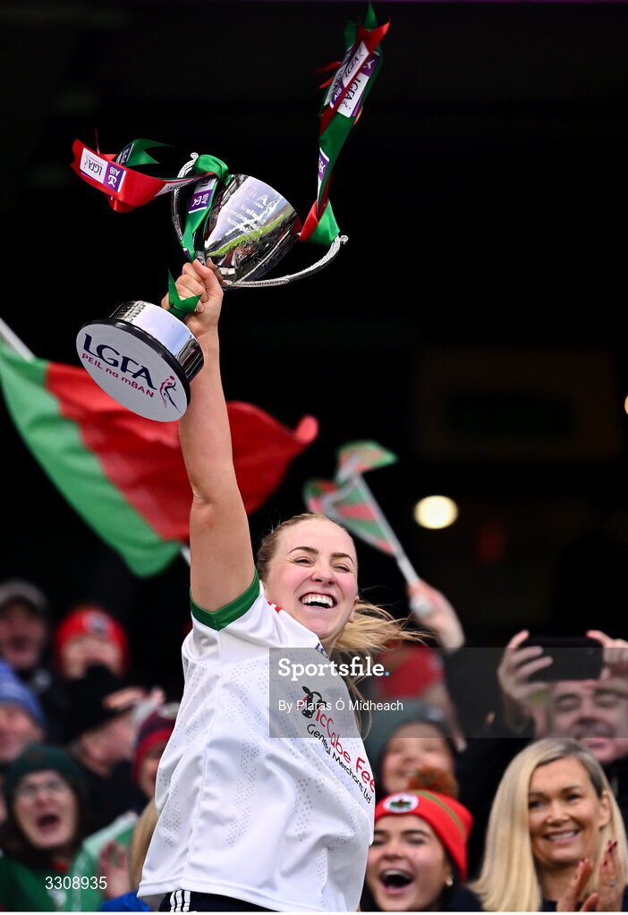 13 December 2025; Knockbride captain Sarah McCabe lifts the cup after her side's victory in the AIB All-Ireland Ladies Football Club Intermediate Club Championship final match between Knockbride of Cavan and Caltra Cuans of Galway at Croke Park in Dublin. Photo by Piaras Ó Mídheach/Sportsfile