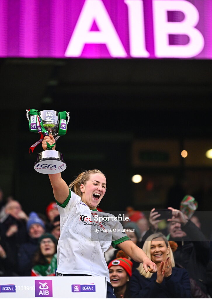 13 December 2025; Knockbride captain Sarah McCabe lifts the cup after her side's victory in the AIB All-Ireland Ladies Football Club Intermediate Club Championship final match between Knockbride of Cavan and Caltra Cuans of Galway at Croke Park in Dublin. Photo by Piaras Ó Mídheach/Sportsfile