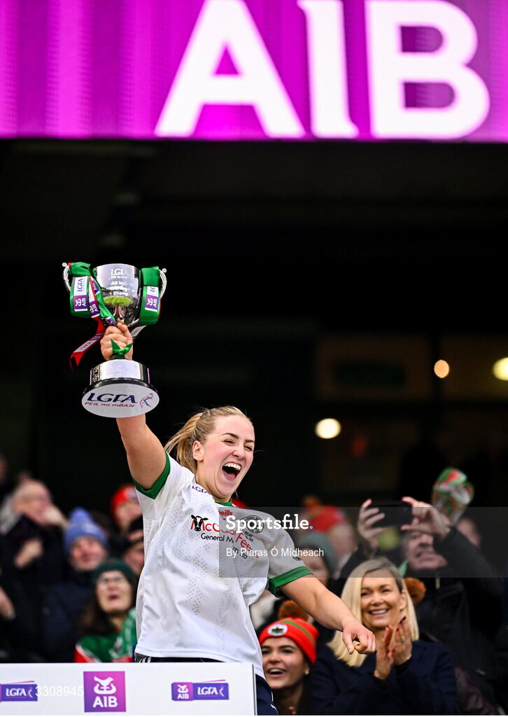 13 December 2025; Knockbride captain Sarah McCabe lifts the cup after her side's victory in the AIB All-Ireland Ladies Football Club Intermediate Club Championship final match between Knockbride of Cavan and Caltra Cuans of Galway at Croke Park in Dublin. Photo by Piaras Ó Mídheach/Sportsfile