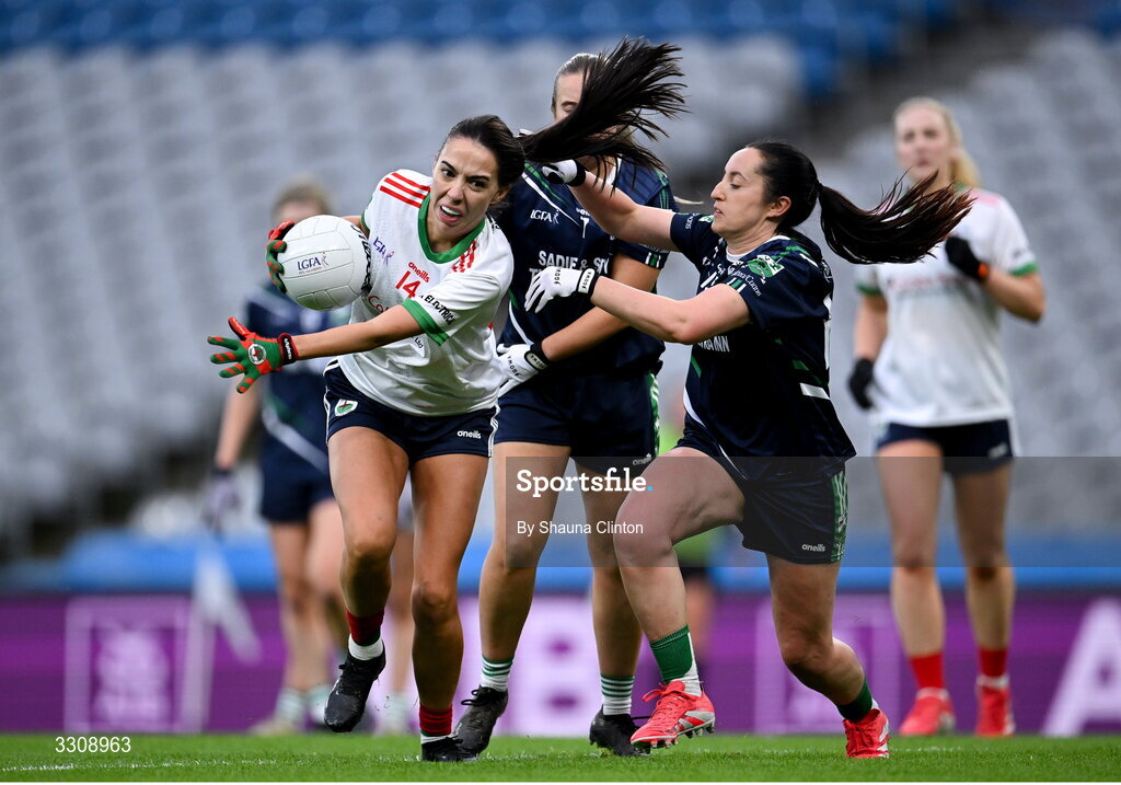 13 December 2025; Katie Rogers of Knockbride in action against Laura Naughton of Caltra Cuans during the AIB All-Ireland Ladies Football Club Intermediate Club Championship final match between Knockbride of Cavan and Caltra Cuans of Galway at Croke Park in Dublin. Photo by Shauna Clinton/Sportsfile