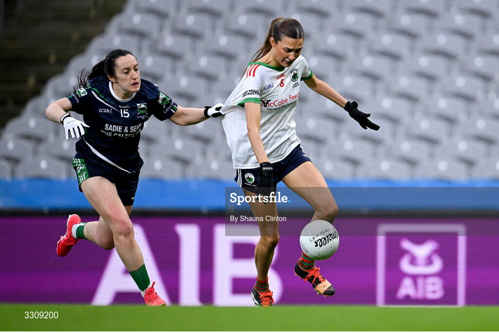 13 December 2025; Tara Rogers of Knockbride in action against Laura Naughton of Caltra Cuans during the AIB All-Ireland Ladies Football Club Intermediate Club Championship final match between Knockbride of Cavan and Caltra Cuans of Galway at Croke Park in Dublin. Photo by Shauna Clinton/Sportsfile