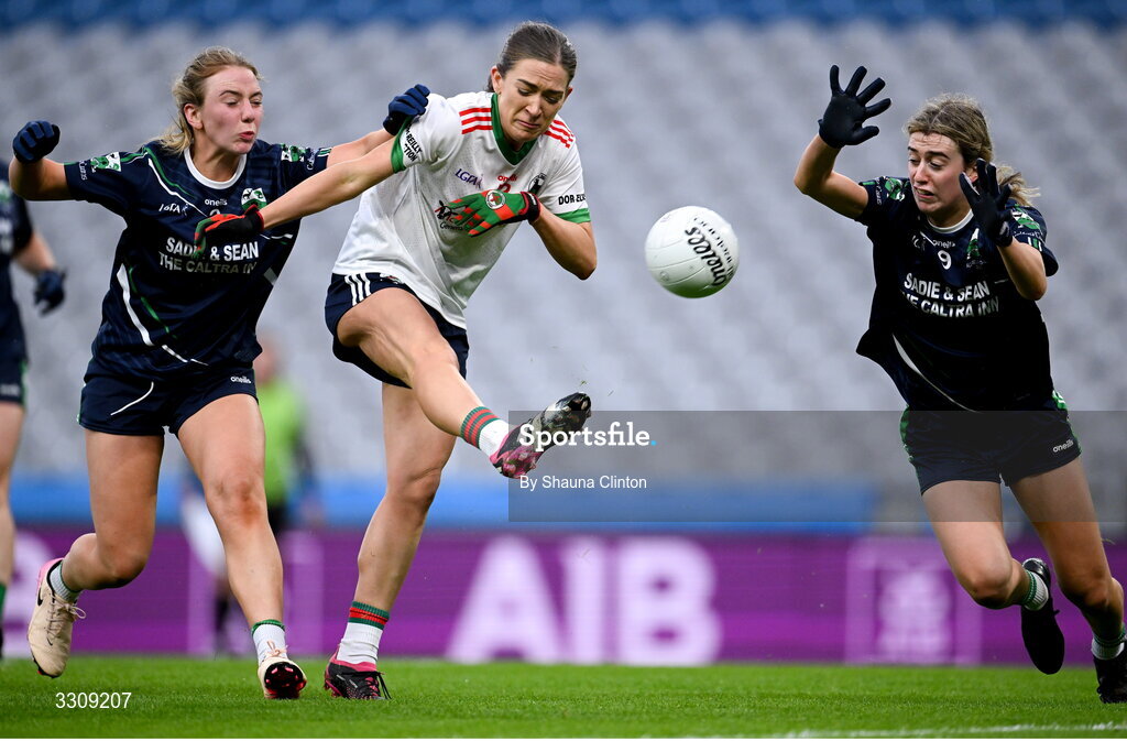 13 December 2025; Aoife Nulty of Knockbride in action against Caoimhe McCabe, left, and Aoibheann Fitzpatrick of Caltra Cuans during the AIB All-Ireland Ladies Football Club Intermediate Club Championship final match between Knockbride of Cavan and Caltra Cuans of Galway at Croke Park in Dublin. Photo by Shauna Clinton/Sportsfile