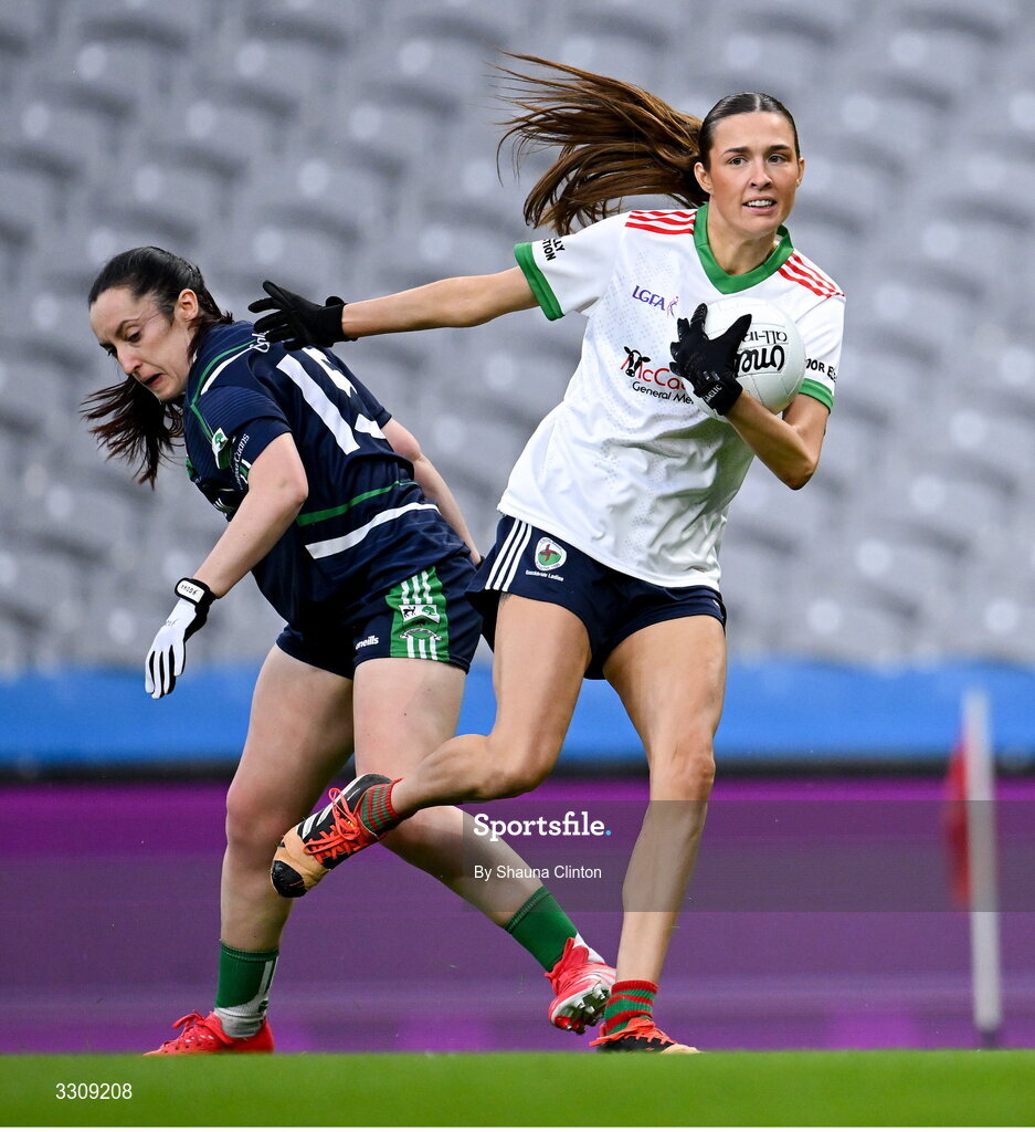 13 December 2025; Tara Rogers of Knockbride in action against Laura Naughton of Caltra Cuans during the AIB All-Ireland Ladies Football Club Intermediate Club Championship final match between Knockbride of Cavan and Caltra Cuans of Galway at Croke Park in Dublin. Photo by Shauna Clinton/Sportsfile