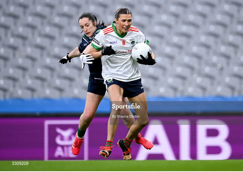 13 December 2025; Tara Rogers of Knockbride in action against Laura Naughton of Caltra Cuans during the AIB All-Ireland Ladies Football Club Intermediate Club Championship final match between Knockbride of Cavan and Caltra Cuans of Galway at Croke Park in Dublin. Photo by Shauna Clinton/Sportsfile