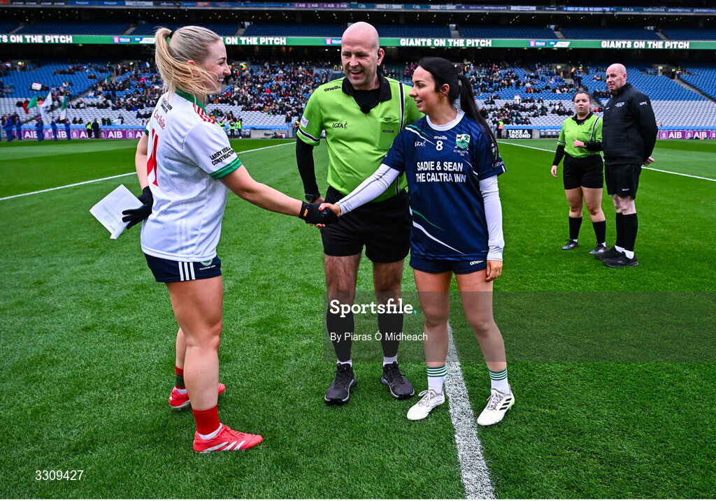 13 December 2025; Referee Kevin Phelan with team captains Sarah McCabe of Knockbride and Denise Kelly of Caltra Cuans before the AIB All-Ireland Ladies Football Club Intermediate Club Championship final match between Knockbride of Cavan and Caltra Cuans of Galway at Croke Park in Dublin. Photo by Piaras Ó Mídheach/Sportsfile