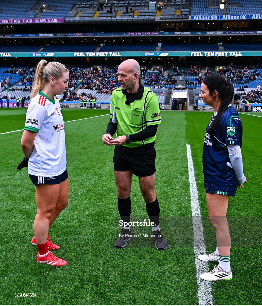 13 December 2025; Referee Kevin Phelan with team captains Sarah McCabe of Knockbride and Denise Kelly of Caltra Cuans before the AIB All-Ireland Ladies Football Club Intermediate Club Championship final match between Knockbride of Cavan and Caltra Cuans of Galway at Croke Park in Dublin. Photo by Piaras Ó Mídheach/Sportsfile
