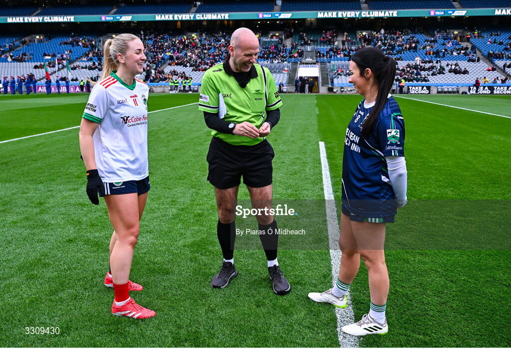 13 December 2025; Referee Kevin Phelan with team captains Sarah McCabe of Knockbride and Denise Kelly of Caltra Cuans before the AIB All-Ireland Ladies Football Club Intermediate Club Championship final match between Knockbride of Cavan and Caltra Cuans of Galway at Croke Park in Dublin. Photo by Piaras Ó Mídheach/Sportsfile