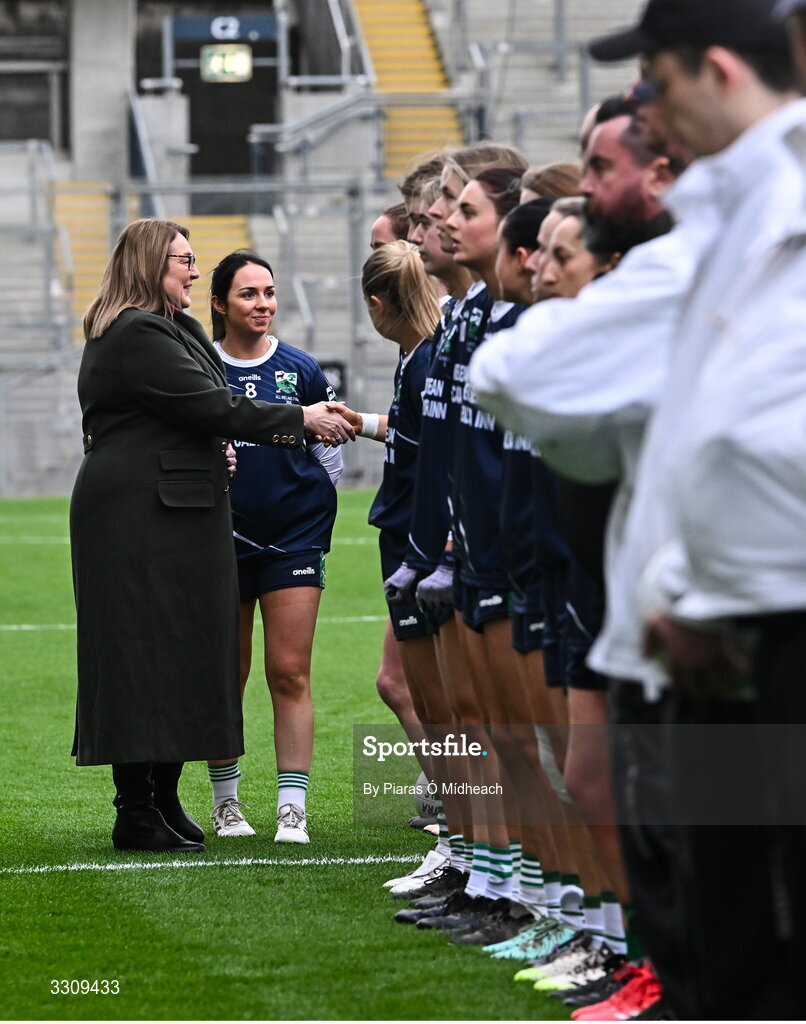 13 December 2025; LGFA President Trina Murray is introduced to the Caltra Cuans players by their captain Denise Kelly before the AIB All-Ireland Ladies Football Club Intermediate Club Championship final match between Knockbride of Cavan and Caltra Cuans of Galway at Croke Park in Dublin. Photo by Piaras Ó Mídheach/Sportsfile