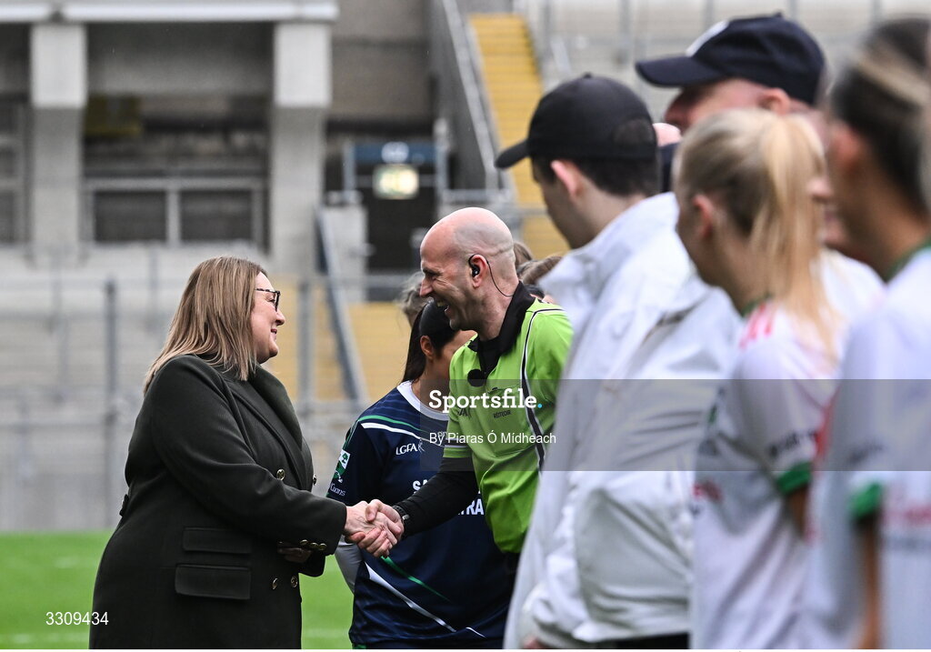 13 December 2025; LGFA President Trina Murray meets with referee Kevin Phelan before the AIB All-Ireland Ladies Football Club Intermediate Club Championship final match between Knockbride of Cavan and Caltra Cuans of Galway at Croke Park in Dublin. Photo by Piaras Ó Mídheach/Sportsfile
