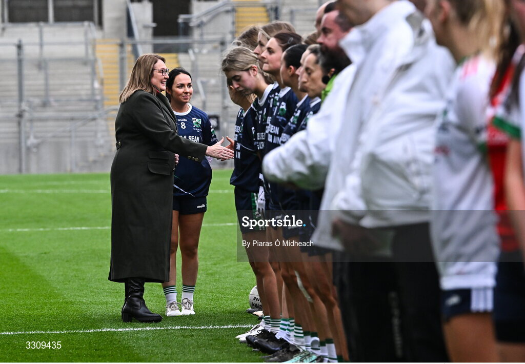 13 December 2025; LGFA President Trina Murray is introduced to the Caltra Cuans players by their captain Denise Kelly before the AIB All-Ireland Ladies Football Club Intermediate Club Championship final match between Knockbride of Cavan and Caltra Cuans of Galway at Croke Park in Dublin. Photo by Piaras Ó Mídheach/Sportsfile