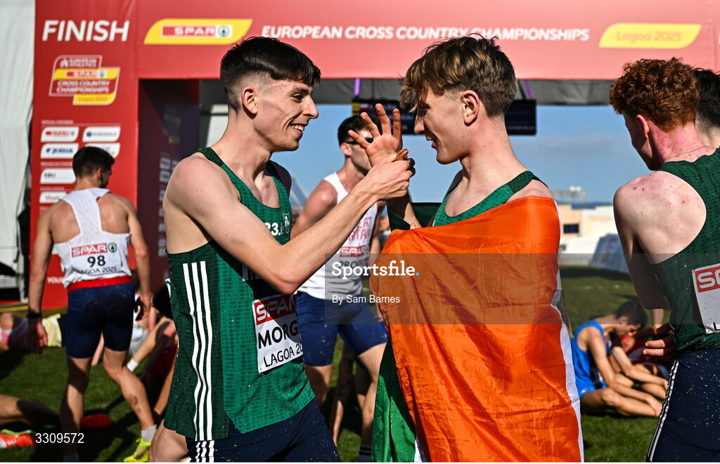 14 December 2025; Nick Griggs of Ireland, right, is congratulated by Callum Morgan after winning the U23 men's race at the 2025 SPAR European Cross Country Championships in Lagoa, Portugal. Photo by Sam Barnes/Sportsfile