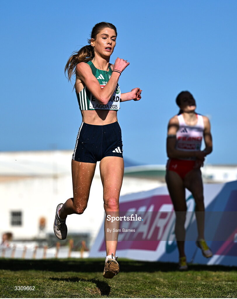 14 December 2025; Fiona Everard of Ireland crosses the finish line in 10th place in the senior women's race at the 2025 SPAR European Cross Country Championships in Lagoa, Portugal. Photo by Sam Barnes/Sportsfile