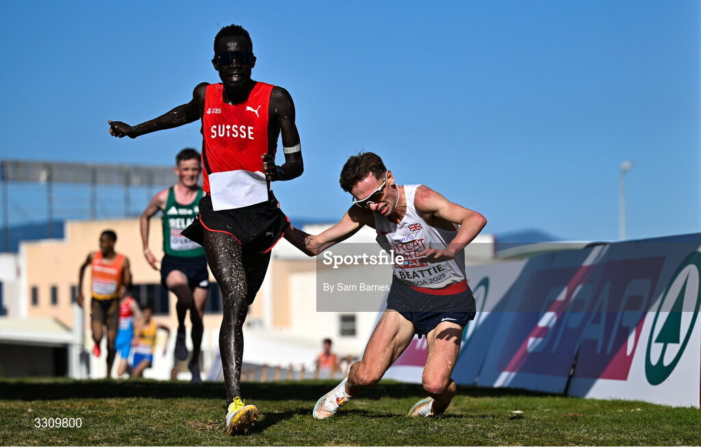 14 December 2025; Scott Beattie of Great Britain crosses the finish line in the senior men's race at the 2025 SPAR European Cross Country Championships in Lagoa, Portugal. Photo by Sam Barnes/Sportsfile