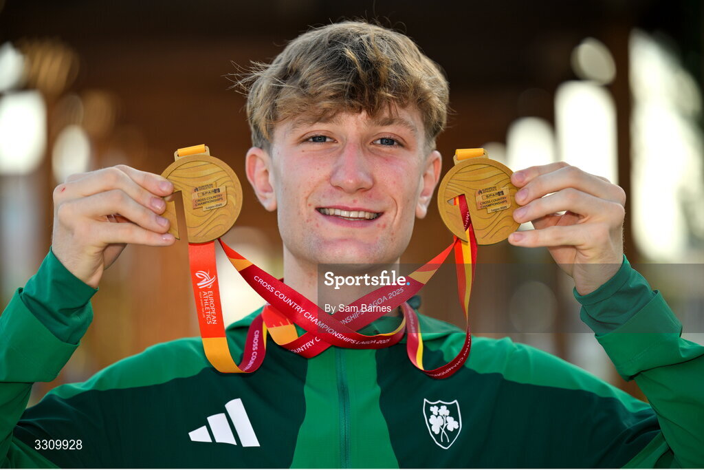 14 December 2025; Nick Griggs of Ireland with his U23 men's individual and team gold medals during the 2025 SPAR European Cross Country Championships in Lagoa, Portugal. Photo by Sam Barnes/Sportsfile