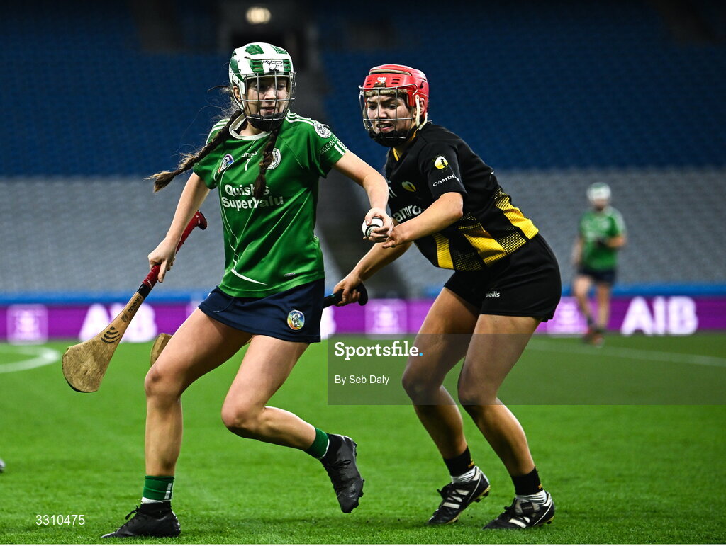 14 December 2025; Ella Cuddy of Camross in action against Gráinne Delaney of Camross during the AIB All-Ireland Camogie Intermediate Club Championship final match between Ballincollig of Cork and Camross of Laois at Croke Park in Dublin. Photo by Seb Daly/Sportsfile
