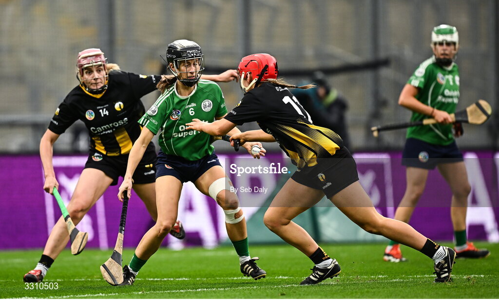 14 December 2025; Leah Weste of Ballincollig in action against Camross players Gráinne Delaney, right, and Sarah-Anne Fitzgerald during the AIB All-Ireland Camogie Intermediate Club Championship final match between Ballincollig of Cork and Camross of Laois at Croke Park in Dublin. Photo by Seb Daly/Sportsfile