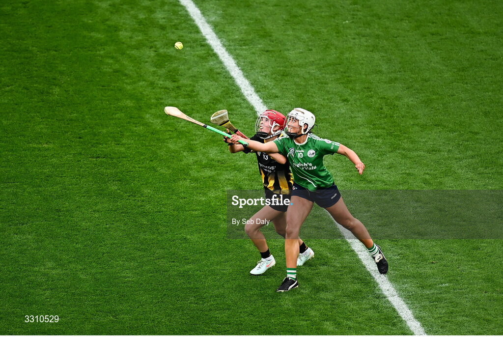 14 December 2025; Erin Walsh of Camross in action against Keeley Goulding of Ballincollig during the AIB All-Ireland Camogie Intermediate Club Championship final match between Ballincollig of Cork and Camross of Laois at Croke Park in Dublin. Photo by Seb Daly/Sportsfile