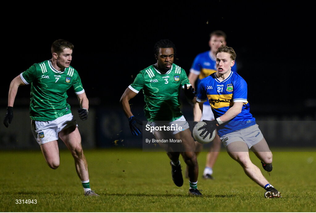 2 January 2026; Daithi Hogan of Tipperary in action against Lee Woulfe, left, and Ciaran Uwatse of Limerick during the McGrath Cup match between Limerick and Tipperary at Mick Neville Park in Rathkeale, Limerick. Photo by Brendan Moran/Sportsfile