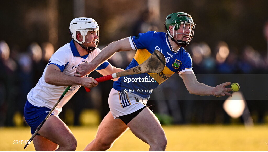 3 January 2026; Brian McGrath of Tipperary is tackled by Charlie Treen of Waterford during the Co-Op Superstores Munster Senior Hurling League match between Tipperary and Waterford at Fethard Town Park in Fethard, Tipperary. Photo by Ben McShane/Sportsfile