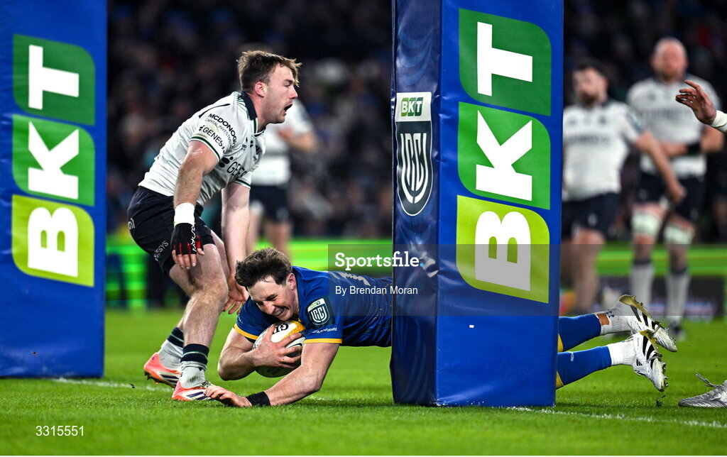 3 January 2026; Charlie Tector of Leinster scores his side's second try despite the attention of David Hawkshaw of Connacht during the United Rugby Championship match between Leinster and Connacht at Aviva Stadium in Dublin. Photo by Brendan Moran/Sportsfile