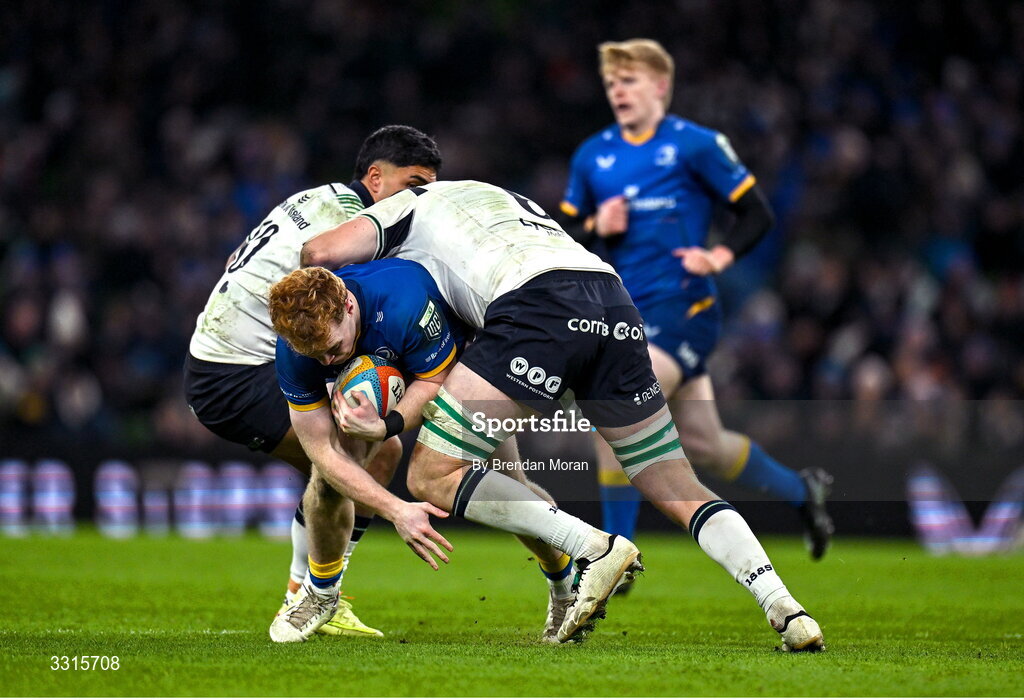 3 January 2026; Hugh Cooney of Leinster is tackled by Josh Ioane, left, and Josh Murphy of Connacht during the United Rugby Championship match between Leinster and Connacht at Aviva Stadium in Dublin. Photo by Brendan Moran/Sportsfile