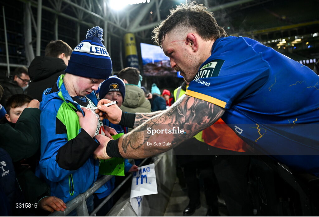 3 January 2026; Andrew Porter of Leinster signs autographs after the United Rugby Championship match between Leinster and Connacht at the Aviva Stadium in Dublin. Photo by Seb Daly/Sportsfile