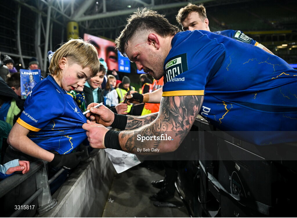 3 January 2026; Andrew Porter of Leinster signs autographs after the United Rugby Championship match between Leinster and Connacht at the Aviva Stadium in Dublin. Photo by Seb Daly/Sportsfile