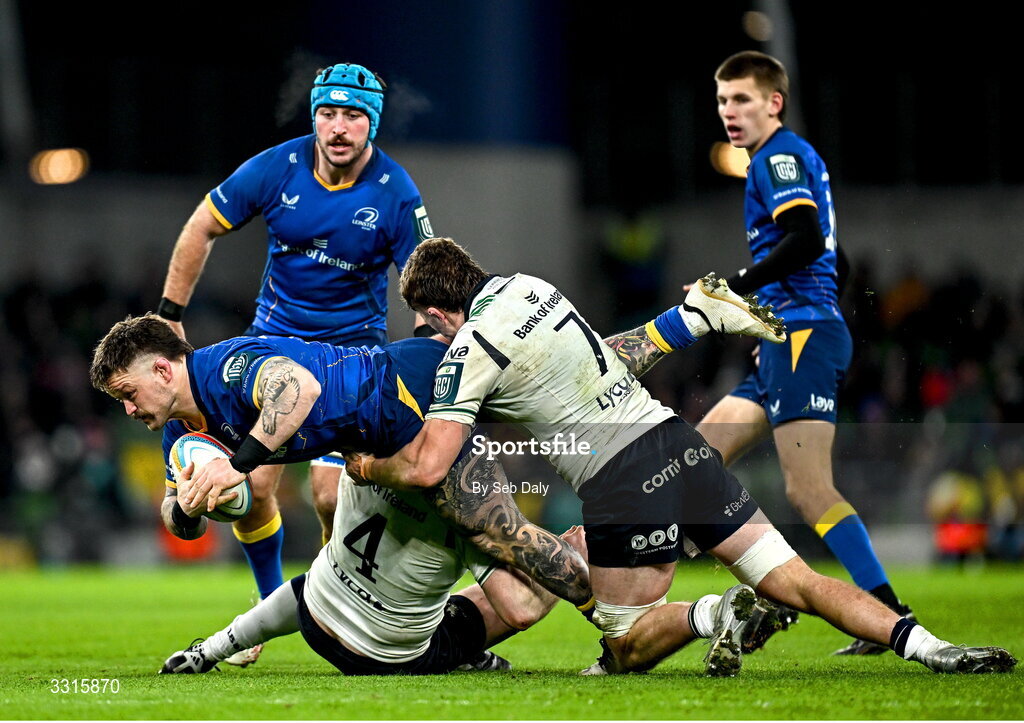 3 January 2026; Andrew Porter of Leinster is tackled by Joe Joyce and Cian Prendergast, 7, of Connacht during the United Rugby Championship match between Leinster and Connacht at the Aviva Stadium in Dublin. Photo by Seb Daly/Sportsfile