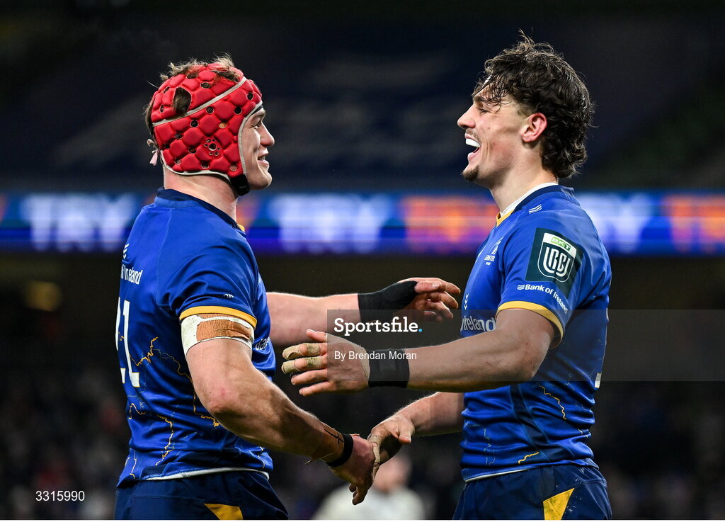 3 January 2026; Joshua Kenny, right, is congratulated by Leinster team-mate Josh van der Flier, left, after scoring their side's eight try during the United Rugby Championship match between Leinster and Connacht at the Aviva Stadium in Dublin. Photo by Brendan Moran/Sportsfile