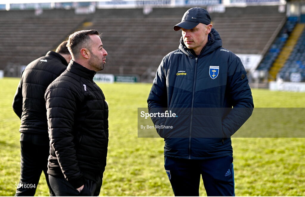 4 January 2026; Scotstown manager David McCague, right, in conversation with standby referee David Gough before the AIB GAA Football All-Ireland Senior Club Championship semi-final match between between St Brigid's of Roscommon and Scotstown of Monaghan at Kingspan Breffni in Cavan. Photo by Ben McShane/Sportsfile
