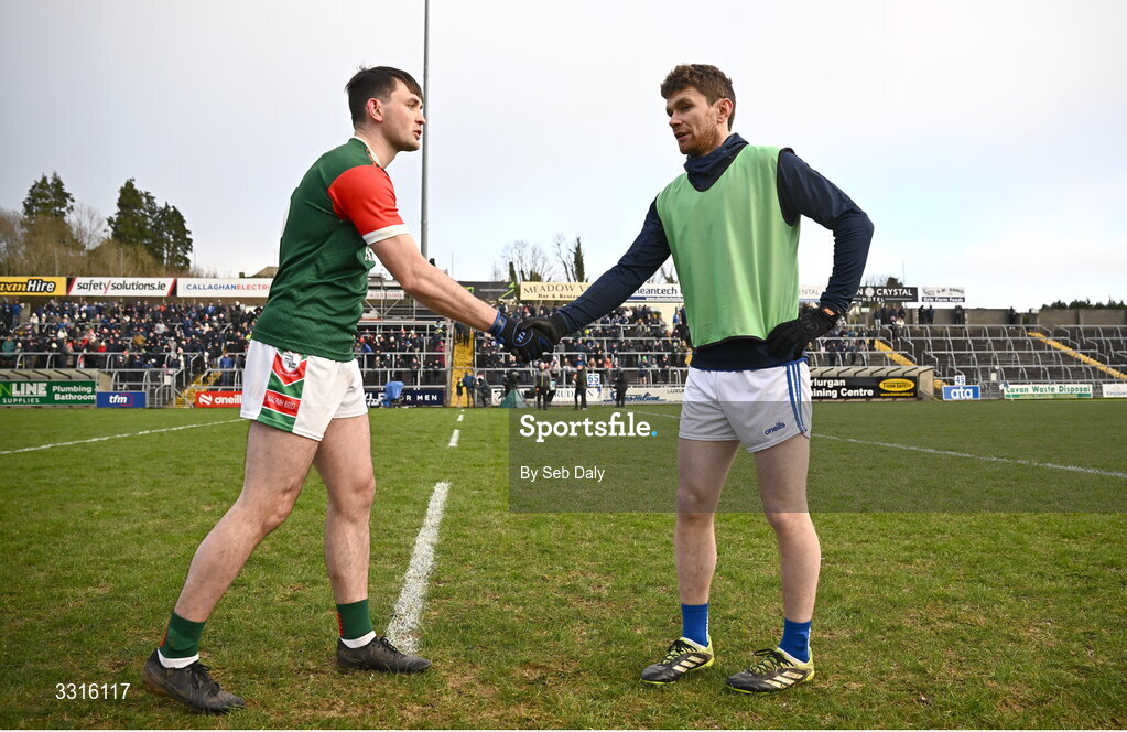4 January 2026; St Brigid's captain Brian Stack, left, and Scotstown captain Damien McArdle shake hands before the AIB GAA Football All-Ireland Senior Club Championship semi-final match between between St Brigid's of Roscommon and Scotstown of Monaghan at Kingspan Breffni in Cavan. Photo by Seb Daly/Sportsfile
