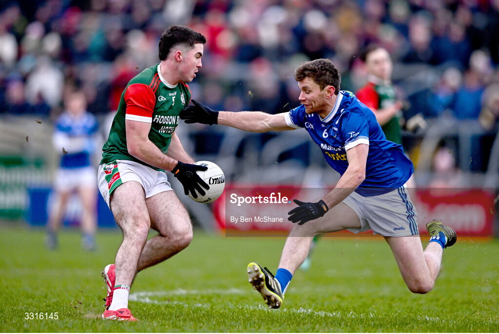 4 January 2026; Ruaidhrí Fallon of St Brigid's evades the tackle of Damien McArdle of Scotstown during the AIB GAA Football All-Ireland Senior Club Championship semi-final match between between St Brigid's of Roscommon and Scotstown of Monaghan at Kingspan Breffni in Cavan. Photo by Ben McShane/Sportsfile