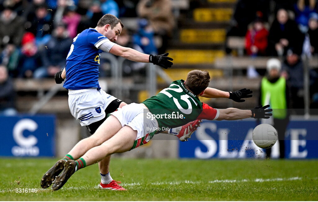 4 January 2026; Jack McCarron of Scotstown scores his side's first goal, despite the efforts of St Brigid's Pearse Frost, during the AIB GAA Football All-Ireland Senior Club Championship semi-final match between between St Brigid's of Roscommon and Scotstown of Monaghan at Kingspan Breffni in Cavan. Photo by Seb Daly/Sportsfile