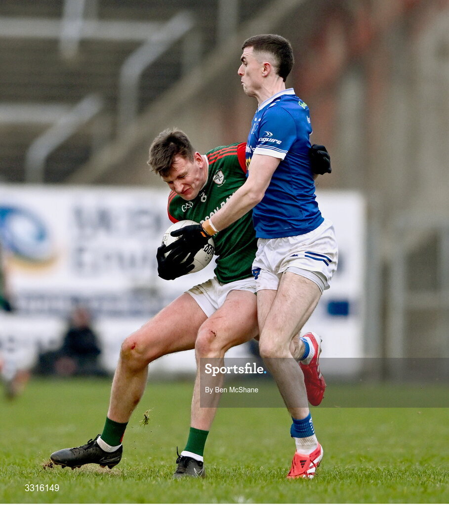 4 January 2026; Shane Cunnane of St Brigid's is tackled by Mícheál McCarville of Scotstown during the AIB GAA Football All-Ireland Senior Club Championship semi-final match between between St Brigid's of Roscommon and Scotstown of Monaghan at Kingspan Breffni in Cavan. Photo by Ben McShane/Sportsfile