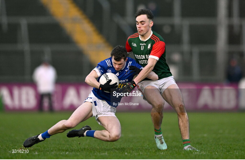 4 January 2026; Darragh Murray of Scotstown is tackled by Conor Hand of St Brigid's during the AIB GAA Football All-Ireland Senior Club Championship semi-final match between between St Brigid's of Roscommon and Scotstown of Monaghan at Kingspan Breffni in Cavan. Photo by Ben McShane/Sportsfile