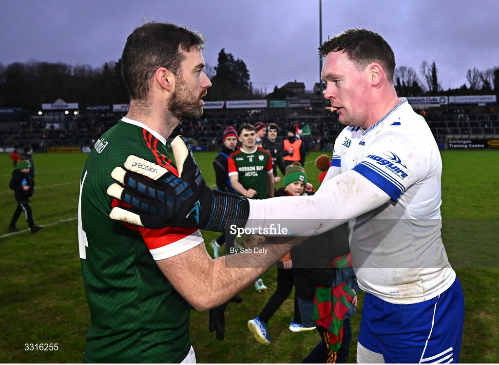 4 January 2026; Senan Kilbride of St Brigid's, left, and Scotstown goalkeeper Rory Beggan after the AIB GAA Football All-Ireland Senior Club Championship semi-final match between between St Brigid's of Roscommon and Scotstown of Monaghan at Kingspan Breffni in Cavan. Photo by Seb Daly/Sportsfile