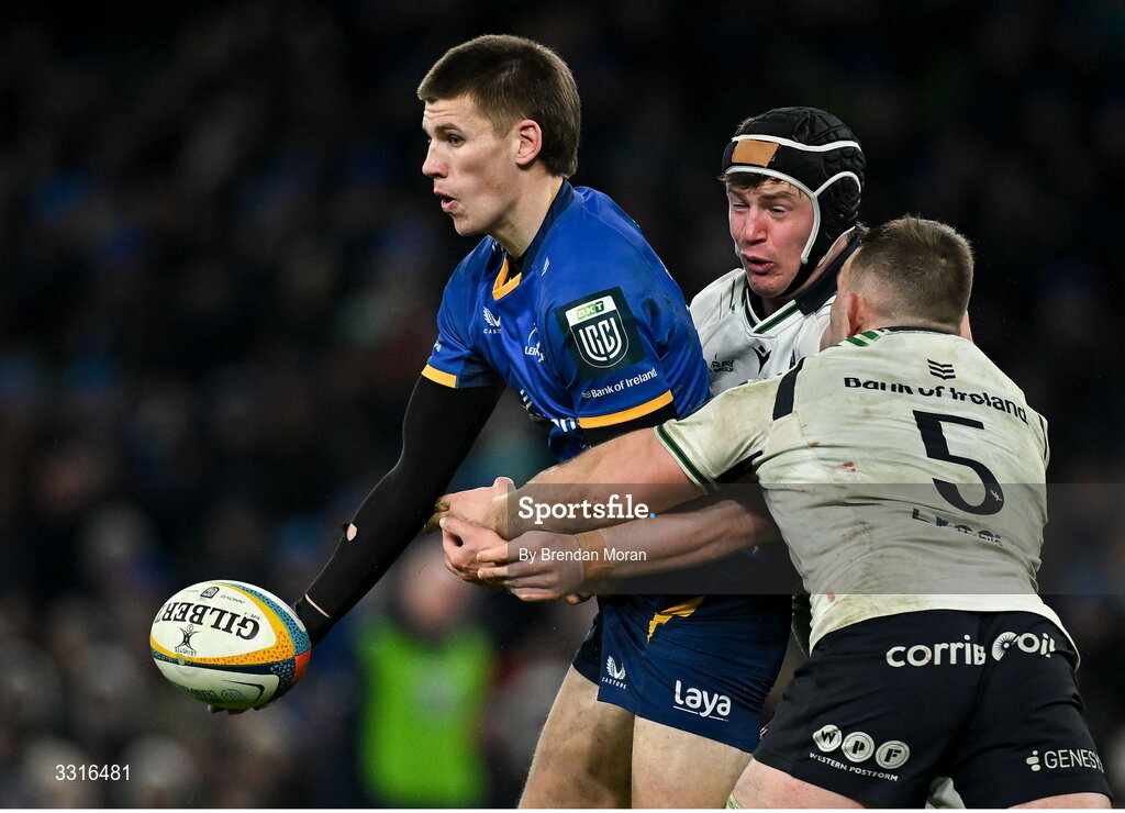 3 January 2026; Sam Prendergast of Leinster is tackled by Darragh Murray and David O’Connor of Connacht during the United Rugby Championship match between Leinster and Connacht at Aviva Stadium in Dublin. Photo by Brendan Moran/Sportsfile