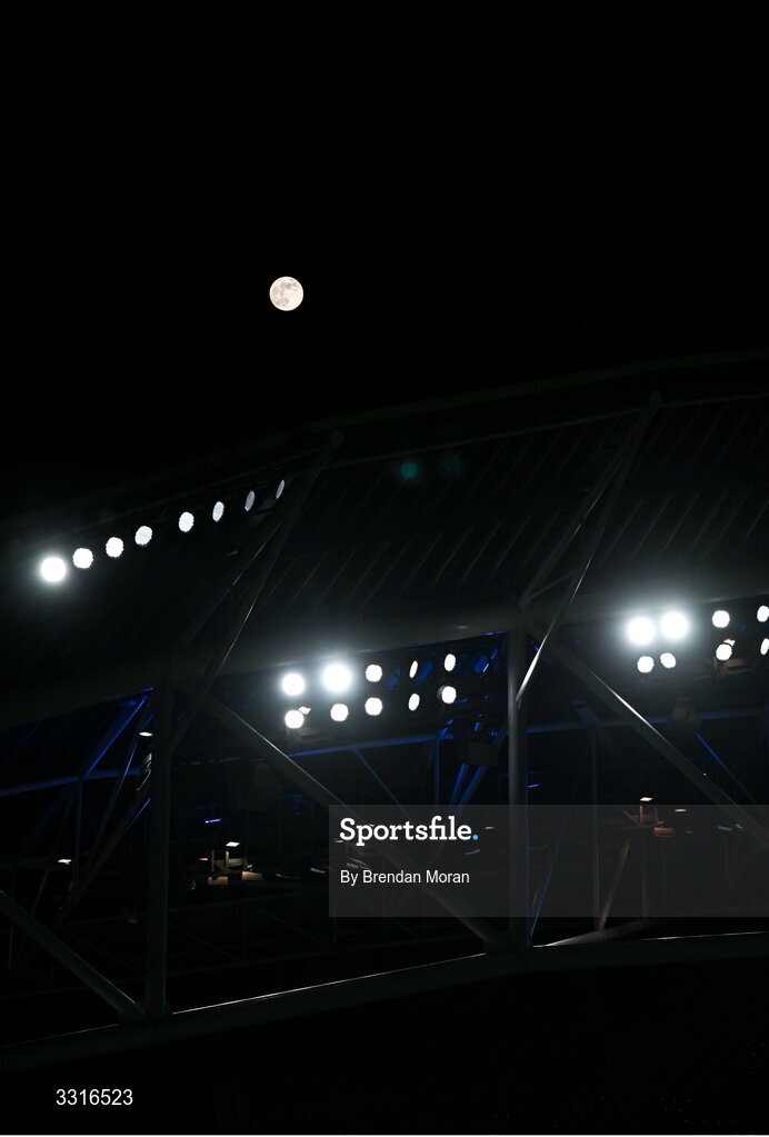 3 January 2026; A waning gibbous moon rises alongside the floodlights after the United Rugby Championship match between Leinster and Connacht at Aviva Stadium in Dublin. Photo by Brendan Moran/Sportsfile