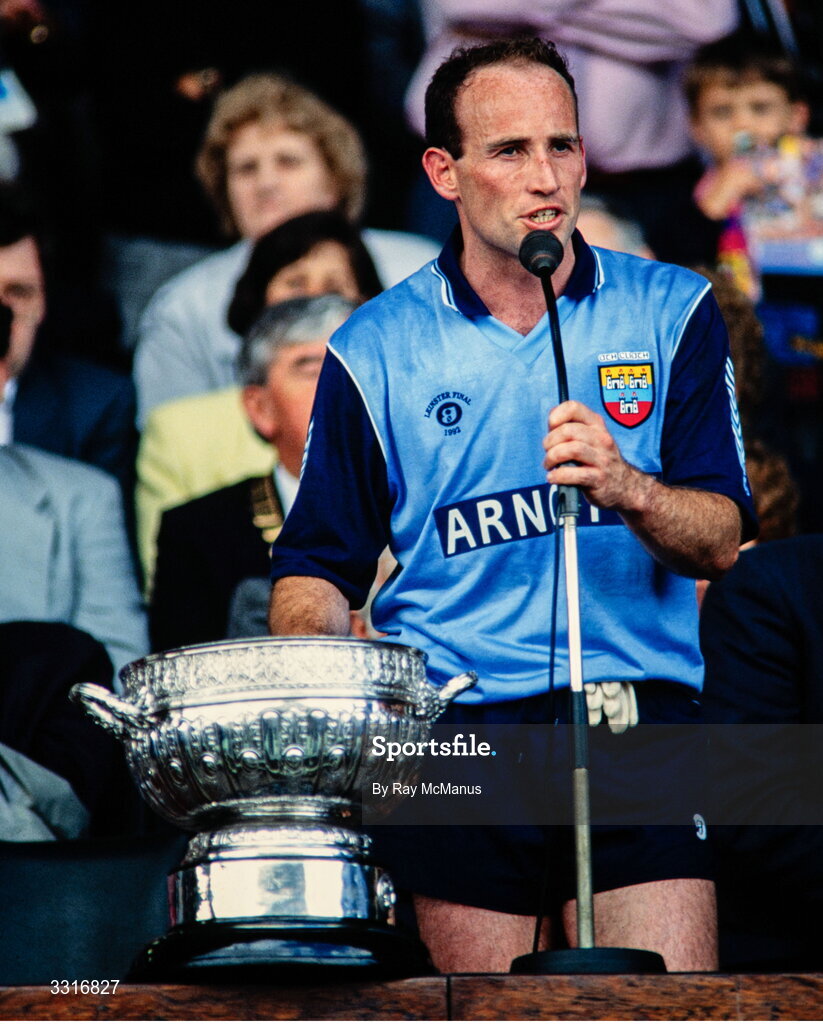 26 July 1992; Dublin captain Tommy Carr pictured alongside the Delaney Cup following the Leinster Senior Football Championship Final match between Dublin and Kildare at Croke Park in Dublin. Photo by Ray McManus/Sportsfile