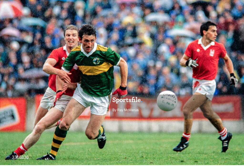 3 July 1988; Ambrose O'Donovan of Kerry is tackled by Larry Tompkins of Cork during the Munster Senior Football Championship Final match between Cork and Kerry at Páirc Uí Chaoimh in Cork. Photo by Ray McManus/Sportsfile