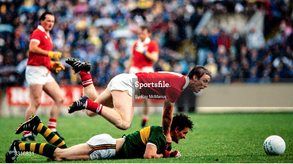 3 July 1988; Ambrose O'Donovan of Kerry is tackled by Larry Tompkins of Cork during the Munster Senior Football Championship Final match between Cork and Kerry at Páirc Uí Chaoimh in Cork. Photo by Ray McManus/Sportsfile