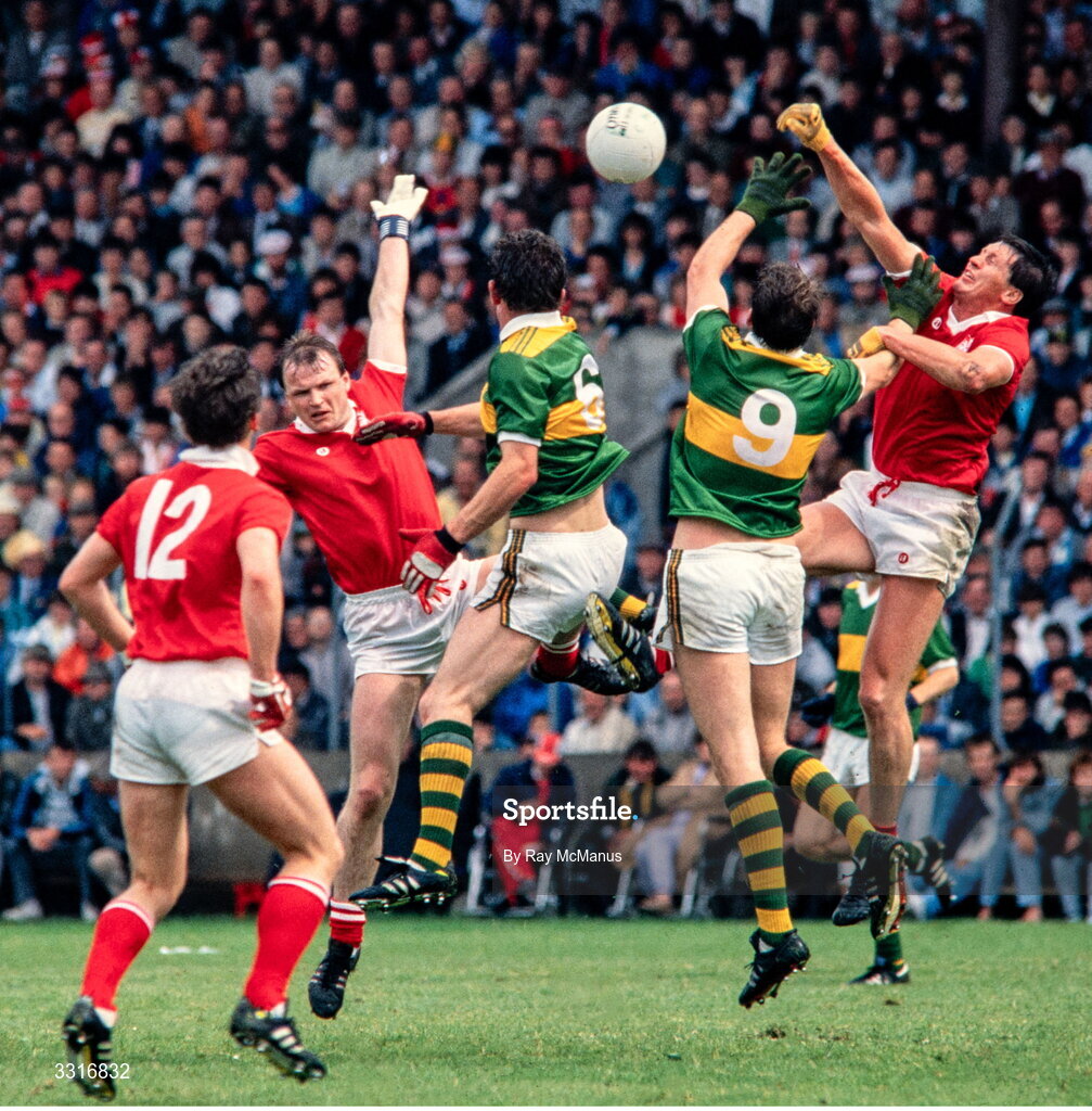 3 July 1988; Kerry players Ambrose O'Donovan, 6, and Dermot Hannafin, 9, contest a high ball against Teddy McCarthy, left, and Shay Fahy of Cork during the Munster Senior Football Championship Final match between Cork and Kerry at Páirc Uí Chaoimh in Cork. Photo by Ray McManus/Sportsfile