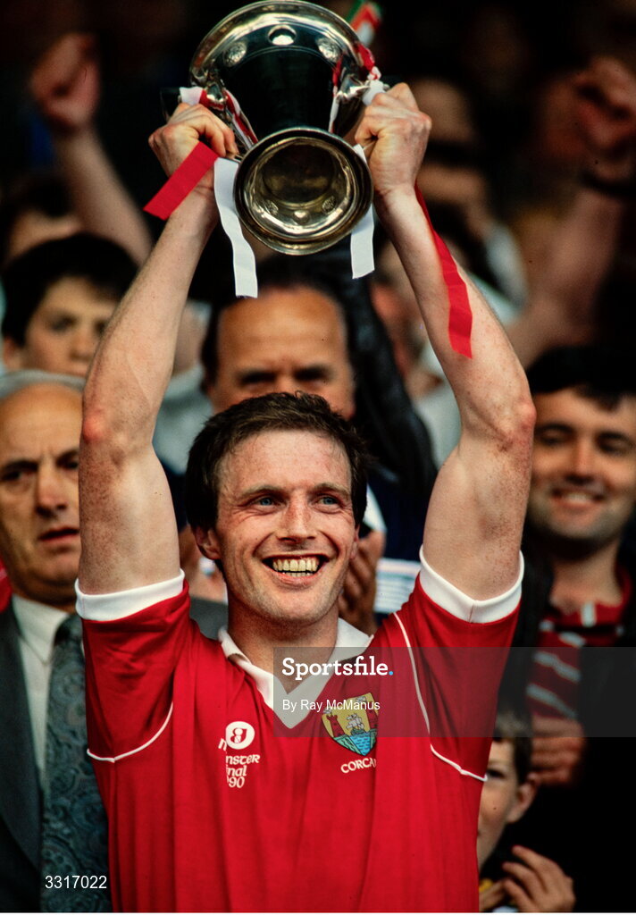 1 July 1990; Larry Tompkins of Cork lifts the cup after his side victory in the Munster Senior Football Championship Final match between Cork and Kerry at Pairc Ui Chaoimh in Cork. Photo by Ray McManus/Sportsfile