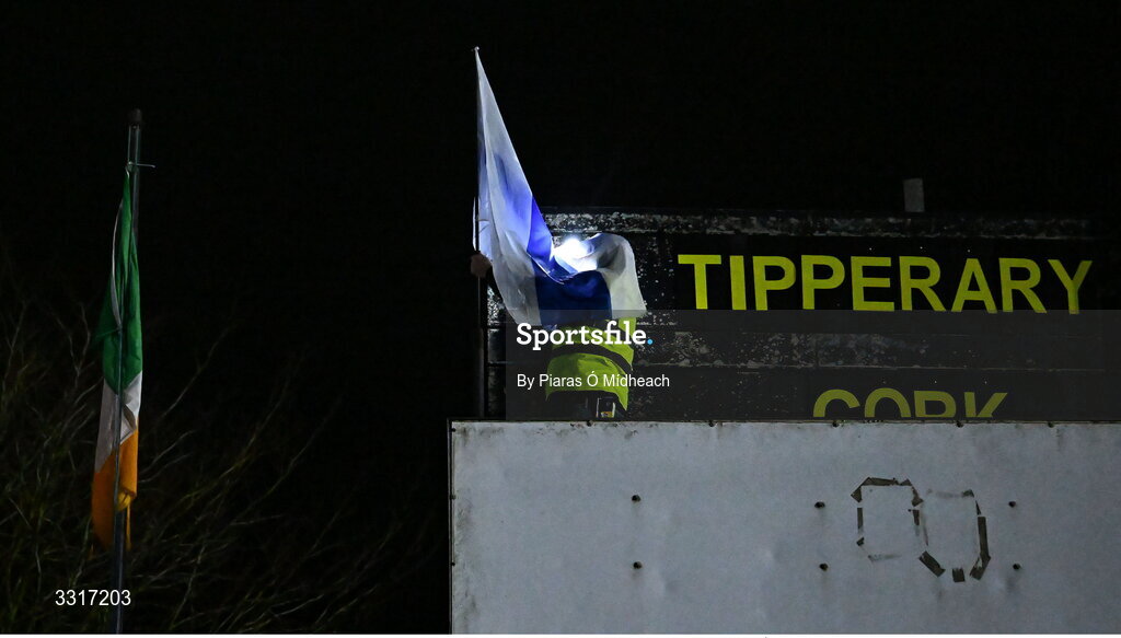 6 January 2026; Groundsman Joe Carmody puts up the Cappawhite GAA club flag before the McGrath Cup match between Tipperary and Cork at Cappawhite GAA Club in Tipperary. Photo by Piaras Ó Mídheach/Sportsfile